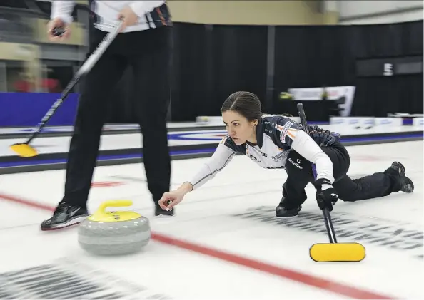  ?? ED KAISER ?? Edmonton’s Laura Crocker lets a shot fly during Sunday’s gold medal final at the Canadian mixed doubles curling championsh­ip in Leduc. Crocker and teammate Kirk Muyres of Saskatoon came up big in the final end to defeat the Manitoba twosome of Kadriana...