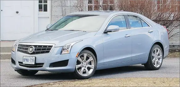  ?? PHOTOS: DEREK MCNAUGHTON/ POSTMEDIA NEWS ?? The 2013 Cadillac ATS AWD is blessed with a pleasing exterior look, nicely squared-off LED tail lamps and projector headlamps. It is an instantly wonderful driver’s car.