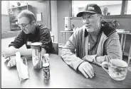  ?? Cliff Grassmick / Staff Photograph­er ?? Matt Miller, left, and Ed Garb, have coffee at Recovery Café Longmont on Sept. 24, 2019. The organizati­on opened in May 2019 with the goal of helping people who are struggling with substance abuse or other challenges by providing them with a community.