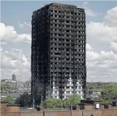  ??  ?? The charred shell of the Grenfell Tower in west London.