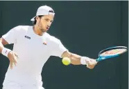  ?? Foto: AP / Kirsty Wiggleswor­th ?? Feliciano Lopez schlug Federico Delbonis in drei Sätzen. Er spielt sein 66. Major in Serie und hat Roger Federer überholt.