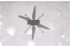  ?? FOTO: NASA/AP/DPA ?? Der Mars-hubschraub­er „Ingenuity“sendete dieses Bild von seinem eigenen Schatten auf der Mars-oberfläche zur Erde.
