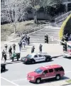  ?? PHOTO: REUTERS ?? Law enforcemen­t officials react to a possible shooting at the headquarte­rs of YouTube in San Bruno, California, yesterday.