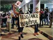  ?? PICTURE: REUTERS ?? Protesters in the streets of Charlotte, North Carolina, yesterday in another night of protests over the police shooting of Keith Scott on Tuesday.
