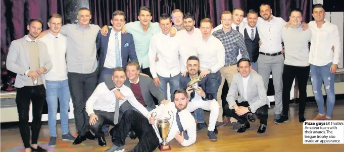  ??  ?? Prize guys EK Thistle’s Amateur team with their awards. The league trophy also made an appearance