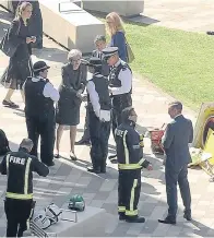  ?? Picture: PA ?? Theresa May during her much-criticised visit to Grenfell Towers.
