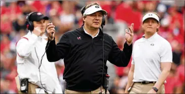  ?? JASON GETZ/AJC 2022 ?? Georgia coach Kirby Smart and the Bulldogs definitely are in the mix, but Smart has never dealt with such attrition — he lost 15 players to the NFL draft, and that will be a factor in the new season.