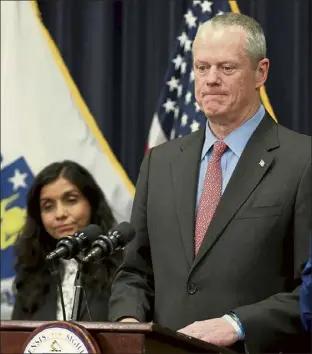  ?? Nancy lane / Boston Herald file ?? Gov. charlie Baker, with public Health commission­er Monica Bharel, talks about the state’s response to the coronaviru­s on March 10, 2020.