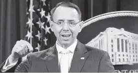  ?? JACQUELYN MARTIN/ASSOCIATED PRESS ?? Deputy Attorney General Rod Rosenstein announces that Special Counsel Robert Mueller says a grand jury has charged 13 Russian nationals and several Russian entities.