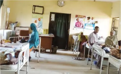  ??  ?? Patients on admission and their relatives at Bauchi State Primary Healthcare Center.