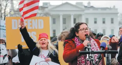  ?? PABLO MARTINEZ MONSIVAIS / ASSOCIATED PRESS ?? Celina Benitez, who was born in El Salvador and migrated with her family to the US as a young child and is now a US citizen, speaks during a rally in Washington on Monday.