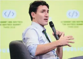  ??  ?? Prime Minister Justin Trudeau participat­es in the discussion at the GovTech summit in Paris on Monday.