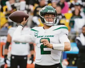  ?? Gene J. Puskar / Associated Press ?? Jets QB Zach Wilson passes against the Steelers last Sunday in Pittsburgh.