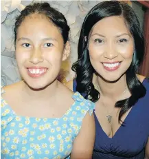  ??  ?? Maya Dimapilis, the B.C. Centre for Ability’s Resource developmen­t director, and her daughter Sadie, a beneficiar­y of the organizati­on’s services, welcomed guests to the annual fundraiser that helped raise money to enhance the quality of life for...