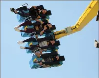  ?? ?? Guests ride the Delirium attraction at California's Great America amusement park in May 2021.