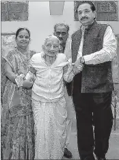  ?? PTI ?? Prime Minister Narendra Modi's mother Hiraba arrives to cast her vote, during the second phase of assembly elections in Gandhinaga­r on Thursday.