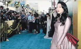  ?? EMMA MCINTYRE GETTY IMAGES ?? She’s the breakout star of the summer. Awkwafina arrives at the première of "Crazy Rich Asians" in Hollywood earlier this month.