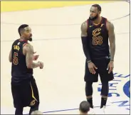  ?? Scott Strazzante / The Chronicle ?? JR Smith, left, and LeBron James react after Smith rebounded a missed free throw in final seconds but dribbled away from basket because he thought the Cavaliers had the lead during Game 1 of the 2018 NBA Finals.