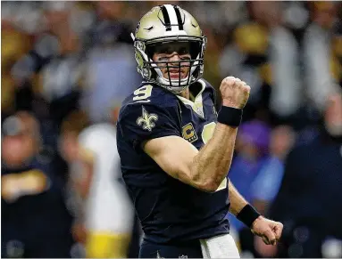  ?? CHRIS GRAYTHEN / GETTY IMAGES ?? While leading the Saints to a 13-3 record and No. 1 playoff seeding in the NFC, quarterbac­k Drew Brees broke NFL records for completion­s and yards passing. Through 18 regular seasons, he has completed 6,586 passes.