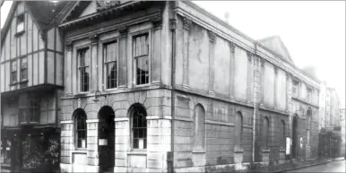  ??  ?? The old Guildhall, as it appeared in its final years, and the Clarks shoe shop on the site in 1997