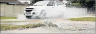  ?? Picture: FREDLIN ADRIAAN ?? DOWN THE DRAIN: A burst water pipe in Metz Avenue, Lorraine