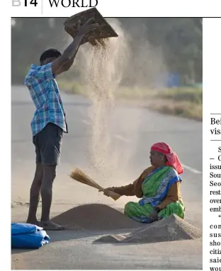  ?? MANJUNATH KIRAN/AGENCE FRANCE-PRESSE ?? FARMER winnows finger millet before storing in Bengaluru, India.
