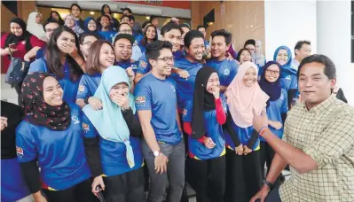  ??  ?? ... Youth and Sports Minister Khairy Jamaluddin meeting participan­ts of the MyCorps: Misi 5@Africa project at the Internatio­nal Youth Centre in Bandar Tun Razak, Kuala Lumpur, yesterday.