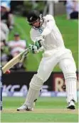  ?? AP ?? A cut above New Zealand’s Martin Guptill plays a cut during his century against Sri Lanka on day one of the first Test yesterday.