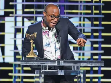  ?? CHRIS PIZZELLO / ASSOCIATED PRESS ?? Barry Jenkins accepts the award for best director for California. at the Film Independen­t Spirit Awards on Saturday in Santa Monica,