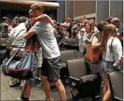  ?? MID-HUDSON NEWS NETWORK PHOTO ?? First-year West Point cadets say goodbye to their families during Reception Day on Monday.