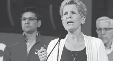  ?? PATRICK DOYLE/THE CANADIAN PRESS ?? Ontario Liberal Leader Kathleen Wynne on the campaign trail in Ottawa on Thursday.