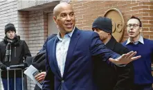  ?? Mark Lennihan / Associated Press ?? U.S. Sen. Cory Booker, D-N.J., leaves ABC studios in New York after an appearance Friday on “The View.”