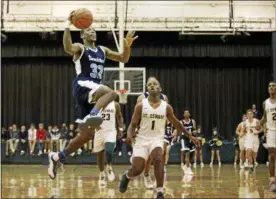  ?? JENNA MILLER — THE NEWS-HERALD ?? Chris Jefferson and Benedictin­e, shown against St. Edward earlier this season, are the No. 4 seed at the Euclid District.