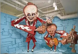  ?? CONTRIBUTE­D BY HUNTER MUSEUM ?? Wayne White’s monumental cardboard, wood, acrylic and rope sculpture of 1950s country music duo the Louvin Brothers is part of “Thrill after Thrill” at Chattanoog­a’s Hunter Museum of American Art.
