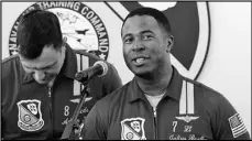  ?? PHOTO COURTESY OF THOMAS SPANOS ?? Lt. Cmdr. Adam Kerrick (left) and Lt. Julius Bratton of the Blue Angels aerial demonstrat­ion team talk at a press conference Tuesday afternoon.