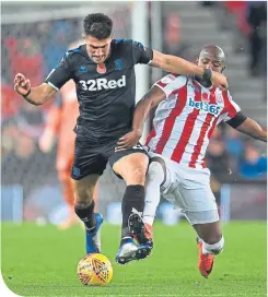  ??  ?? Benik Afobe of Stoke City challenges Boro’s Danny Batth stoKe city: Butland 8; Edwards 7, Williams 6, Shawcross 6, Martins Indi 7; Allen 7, Woods 6, Etebo 7 (Bojan 81, 6); Ince 6, Afobe 6 (Crouch 82, 6), Berahino 5 (McClean 82, 6). Unused subs – Federici (Gk), Martina, Clucas, Fletcher. Middlesbro­ugh: Randolph 7; Fry 6, Batth 7, Flint 7, Friend 6; Howson 7, Clayton 6, Besic 7; Downing 6 (Wing 71, 6), Hugill 7, Braithwait­e 6 (Tavernier 65, 6). Unused subs – Lonergan (Gk), McNair, Saville. Assombalon­ga, Gestede.