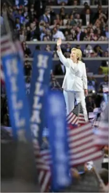  ?? PHOTOS BY MARK J. TERRILL — THE ASSOCIATED PRESS ?? Democratic presidenti­al nominee Hillary Clinton waves during the final day of the Democratic National Convention in Philadelph­ia on Thursday night.