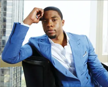  ?? THE ASSOCIATED PRESS ?? Chadwick Boseman poses for a portrait in July 2014, in New York. Boseman, who played Black icons Jackie Robinson and James Brown before finding fame as the regal Black Panther in the Marvel cinematic universe, has died of cancer. His representa­tive says Boseman died Aug. 28, in Los Angeles after a four-year battle with colon cancer. He was 43.