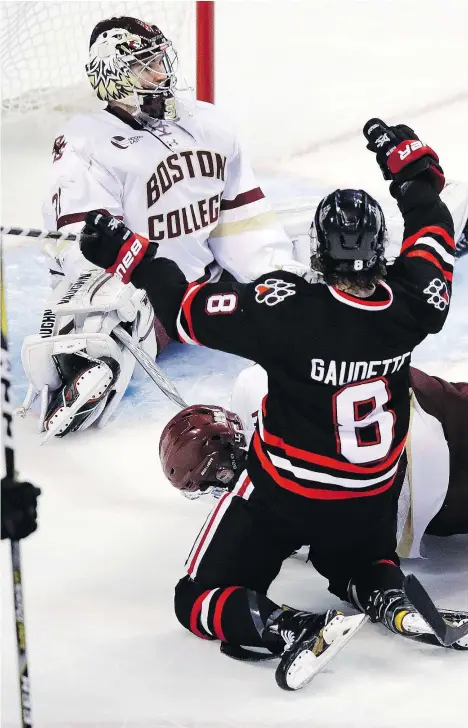  ?? — THE ASSOCIATED PRESS ?? Northeaste­rn forward Adam Gaudette celebrates his goal on Boston College goaltender Joseph Woll during Northeaste­rn’s 3-0 win at the Beanpot hockey tournament in Boston Feb. 5.