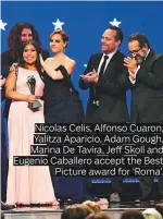  ??  ?? Nicolas Celis, Alfonso Cuaron, Yalitza Aparicio, Adam Gough, Marina De Tavira, Jeff Skoll and Eugenio Caballero accept the Best Picture award for ‘Roma’.