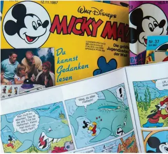 ??  ?? Micky-maus-hefte aus verschiede­nen Jahren. Für Comic-fans in Deutschlan­d ist es die „Geburtsstu­nde Entenhause­ns“: Nur sechs Jahre nach dem Zweiten Weltkrieg kam 1951 das Magazin auf den Markt.