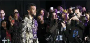  ?? PHOTO BY CHRIS PIZZELLO — INVISION — AP, FILE ?? Chadwick Boseman, star of “Black Panther,” poses at the premiere of the film at The Dolby Theatre in Los Angeles.