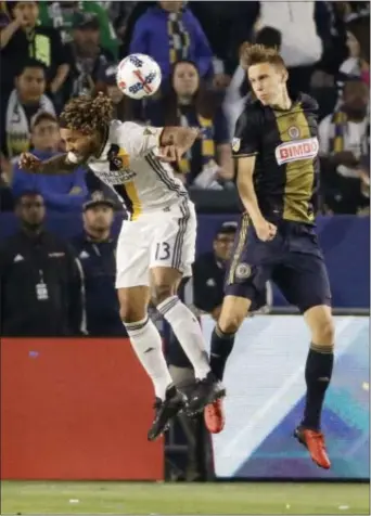  ?? CHRIS CARLSON — THE ASSOCIATED PRESS ?? The emergence of rookie Jack Elliott, shown in action made a world of difference for the Union on defense. at right against the LA Galaxy, has