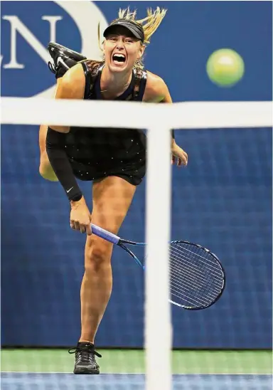  ?? — Reuters ?? Take that: Russia’s Maria Sharapova serving to the United States’ Sofia Kenin in the third round. Sharapova won 7-5, 6-2.