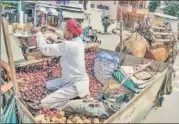  ?? PTI ?? A vendor selling onions in Ajmer on Monday.