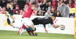  ??  ?? New Zealand All Black Rieko Ioane scores a try during the first test between the British and Irish Lions and the All Blacks at Eden Park in Auckland, New Zealand, on Saturday. (AP)