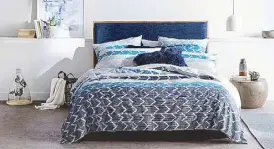  ??  ?? Bridgewate­r Midnight quilt cover is a twist on the classic stripe pattern, available at Sheridan showrooms.