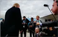  ?? AP PHOTO BY EVAN VUCCI ?? President Donald Trump listens to a question about the missing Saudi journalist Jamal Khashoggi after landing at Cincinnati Municipal Lunken Airport, Friday, Oct. 12, in Cincinnati, Ohio.