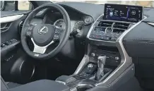  ??  ?? Drivers will find an inviting wraparound cockpit inside the Lexus.