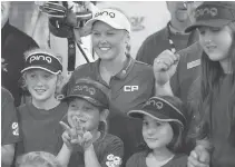  ??  ?? Canadian golfer Brooke Henderson will be cheered on by hometown fans both young and old next week at the Ottawa Hunt and Golf Club.
